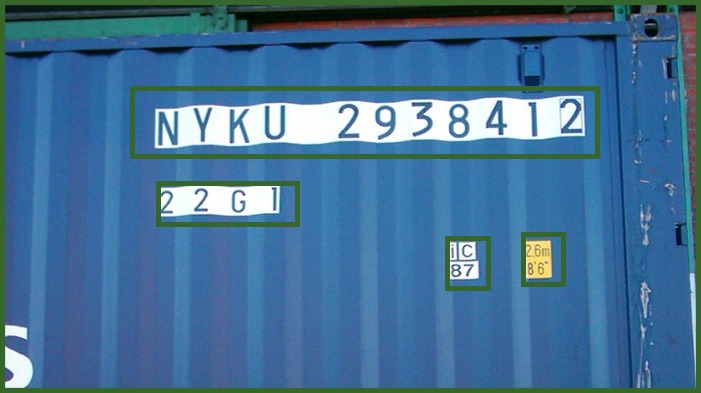 Container text regions for OCR in logistics Container identification number and other markings highlighted for OCR in logistics